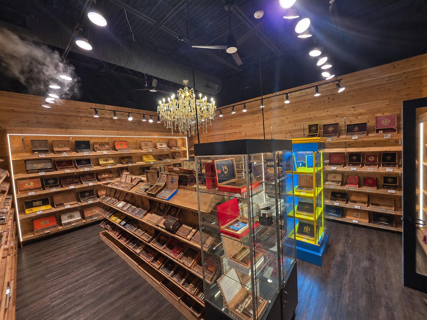 The walk-in humidor at Cheroots, cedar shelves stocked with cigar boxes